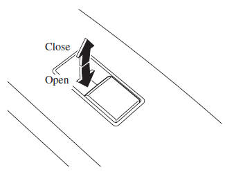 Mazda 3. Operating the Passenger Power Windows