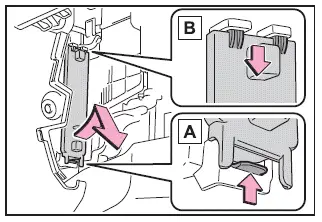 Subaru Solterra filter cover removal locking tab and clip positions