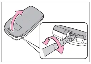 Subaru Solterra key cover opening using flathead screwdriver with protective tape