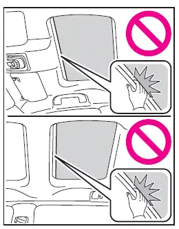 Subaru Solterra electronic sunshade safety warning hand position illustration