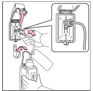 Subaru Solterra AC charging cable connected to outlet with CCID properly supported