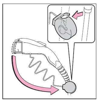 Subaru Solterra charging connector cap removed and secured to cable