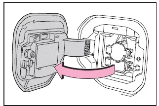 Subaru Solterra charging port open with inlet light indicating readiness for DC charging