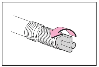 Subaru Solterra preparing hose and removing air release cap