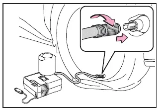 Subaru Solterra hose securely connected to tire valve