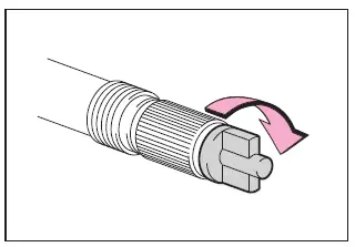 Subaru Solterra reinstalling valve cap and securing hose after repair