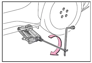 Subaru Solterra lifting vehicle with jack tire off ground