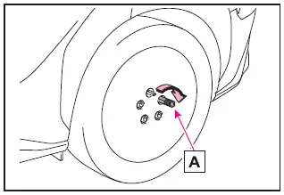 Subaru Solterra hand tightening wheel bolts initial stage