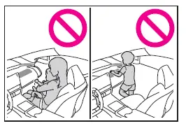 Subaru Solterra unsafe child position near front airbag illustration