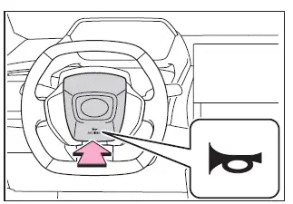 Subaru Solterra horn press area demonstration on steering wheel